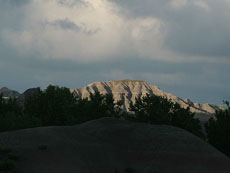 Dakota Sud - Immersion en ranch - rocher au soleil dans les Badlands  : Randocheval